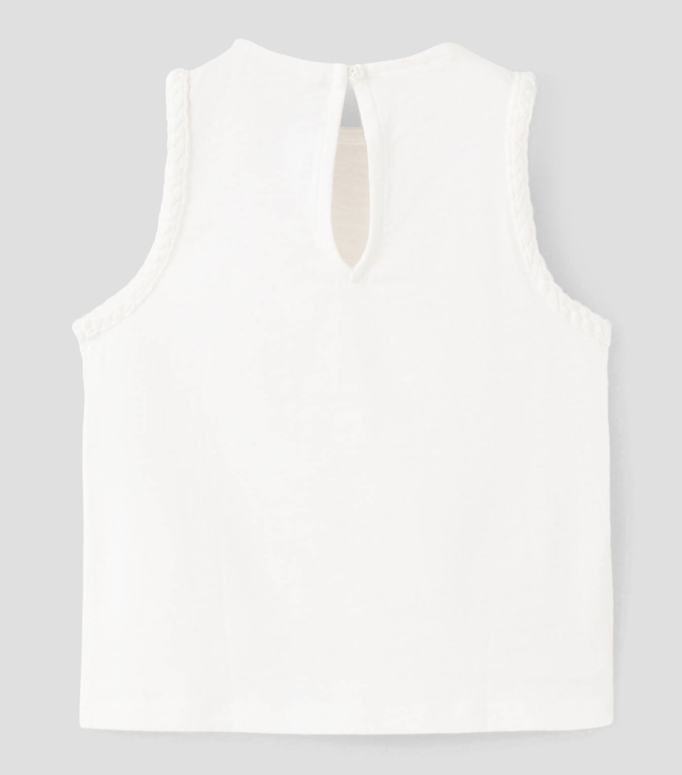 Playera cuello redondo sin mangas lisa Niña